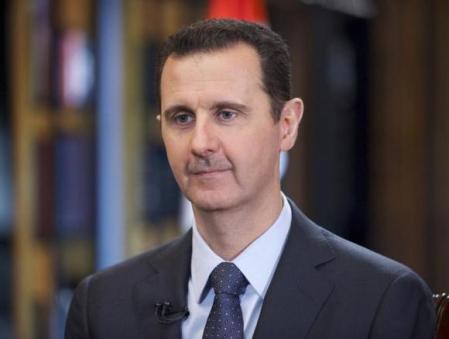 Syria's President Bashar al-Assad speaks during an interview in September 2014
